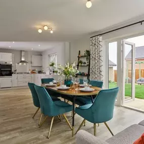 The Dorking show home open plan kitchen/dining room at Claybourne