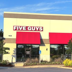 An exterior photograph of the Five Guys restaurant at 1028 Marble Terrace Street in Hoover, Alabama.