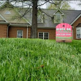 Our client in Midlothian, VA showing off their healthy, fertilized grass!