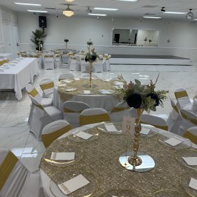 Front Street Banquet Hall gold and white decor