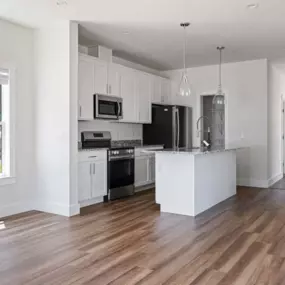 The kitchen at Belle Meadow Homes combines functionality with elegant, custom finishes.