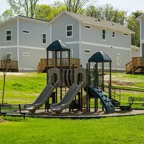 The playground at Belle Meadow Homes provides a fun and safe area for children to play.