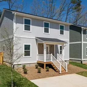 The exterior of the Charlotte model at Belle Meadow Homes highlights classic design and spacious living.