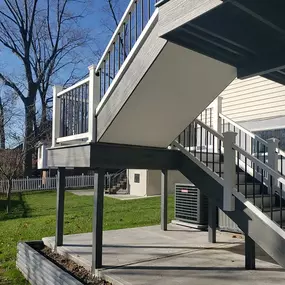 Composite Deck Stairs with Railings built by Decks By Murray