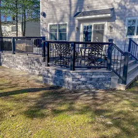 Custom deck with black railings built by Decks by Murray