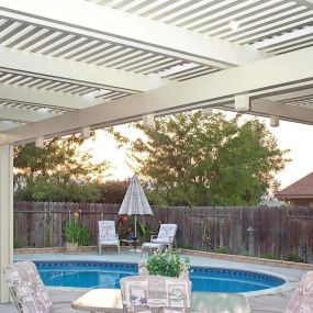 Custom design aluminum lattice structure next to pool in Hemet, CA.