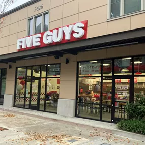 Exterior photograph of the Five Guys restaurant at 3626 Market Place in University Place, Washington.