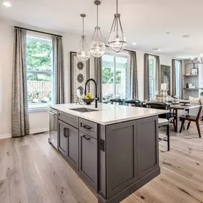 The open-concept kitchen flows effortlessly into the casual dining area and great room, making this floor plan ideal for entertaining