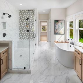 Spa-inspired primary bathrooms