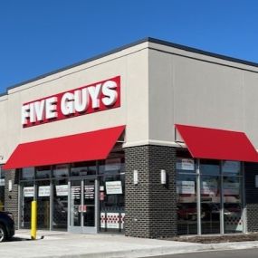 Exterior photograph of the Five Guys restaurant at 35109 S. Gratiot Avenue in Clinton Township, Michigan.