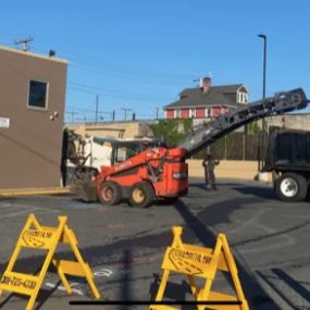 Chamberlain Contractors work vehicles outside a Wells Fargo Bank