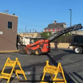 Chamberlain Contractors work vehicles outside a Wells Fargo Bank