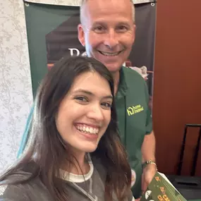 Our owner being led to Camp Chamber by one of the local Chamber  of Commerce leaders - McKenna!