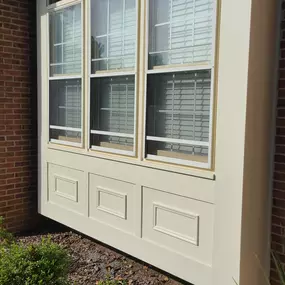 Detailed intricate and durable aluminum trim cappng on a bay window for maintenance trim