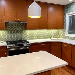 Full Kitchen remodel in Sleepy Hollow: custom cabinetry, tile work, quatrz countertop, floating shelves, modern lightning & floor refinishing
