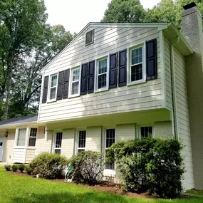 A full exterior renovation in Oakton with Certainteed LandMark shingles, James Hardie siding, new vinyl soffit & custom aluminum fascia/trim capping & raised panel shutters. New gutters & and fresh masonry painting completed the transformation!
