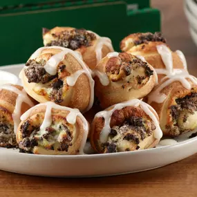 Eight sweet bites of OREO® Cookie wrapped in our original fresh dough and drizzled in icing. Baked fresh and served with cream cheese icing dipping sauce on the side.