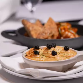 Try our Maine Lobster Escargot and experience the elegance of fine dining at Ocean 48