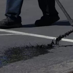 Our contractors offer asphalt sealcoating services for properties in Northern Virginia and the D.C. Metro area. Call our team today!