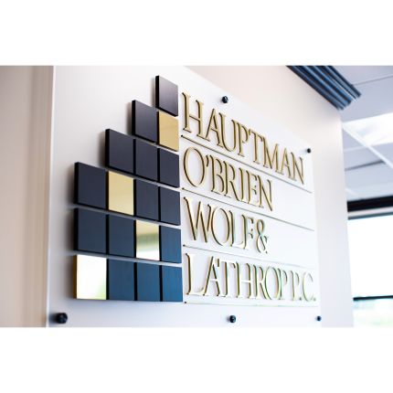 Logo van Hauptman, O'Brien, Wolf & Lathrop, P.C.