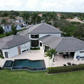 We replaced this roof and installed flat tiles from Eagle. This roof tile color is called Sierra Madre. This roof also has mitered hips and ridges for a seamless look.