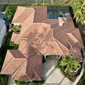 We replaced this roof and installed a barrel tile from Eagle called Floridian Blend.