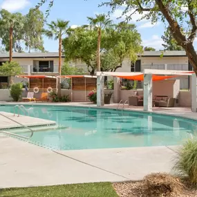 The resort-style pool at Sentry Tempe Apartments offers a luxurious space for relaxation and swimming.