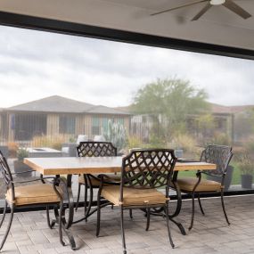 Enhance your outdoor living space with exterior motorized shades from Budget Blinds of North Raleigh and Wake Forest! Effortlessly control sunlight with the touch of a button and say hello to convenience and relaxation in style!