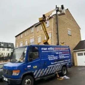 Bild von Man with a Cherry Picker Van