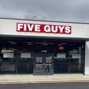 Exterior photograph of the Five Guys restaurant at 1180 N. Central Avenue in Somerset, Pennsylvania.