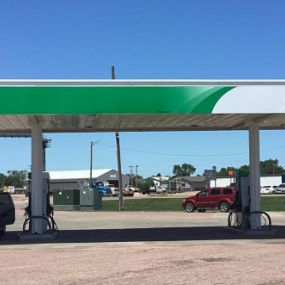 Sinclair gas station fueling island.