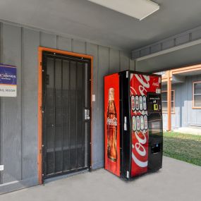 a vending machine sits outside of a building