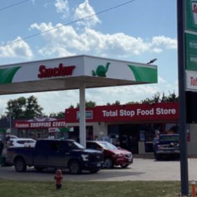 Sinclair gas station fueling island