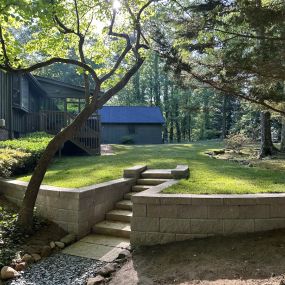 Beautiful retaining wall and staircase by RC Landscapes