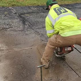 Here you'll see our guys at Rogers Drain Solutions cutting old catch basin's out as part of a parking lot drainage project.