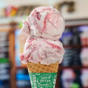Strawberry Swirl Non-Dairy in Sugar Cone in a Ben & Jerry's ice cream shop. Strawberry Swirl is Strawberry Non-Dairy Frozen Dessert with Strawberry Swirls.