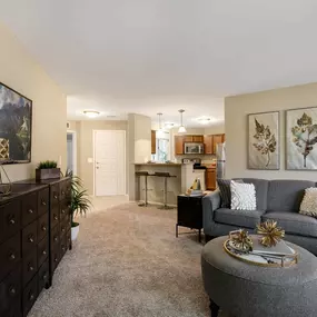 Living Room With TV at Amberly Apartments, Michigan, 48322