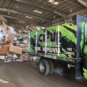 The Pick-Up Artist Junk Removal truck with waste