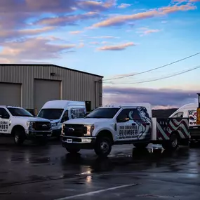 The Original Plumber HVAC, Septic & Electrical work trucks