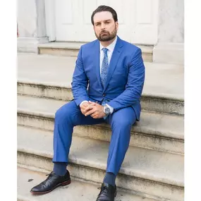 Mark sitting on the courthouse steps