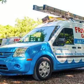 Frank Gay Services white and blue work van