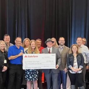 Proud to have been part of presenting a $2,000 donation to the Badger Honor Flight along with these other amazing State Farm Agents.