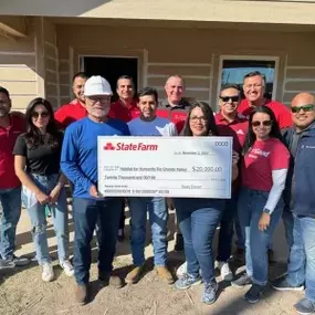 Check out this awesome donation check from Trae Pena State Farm! While we've got your attention, let us take care of your insurance needs too.
