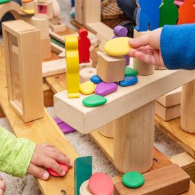 Nurturing Knowledge Preschool Maple Children with Building Blocks