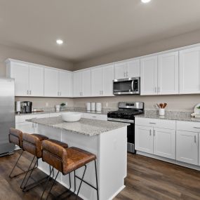 Open concept kitchen in the Mesilla model home in Corley Farms by Centex.