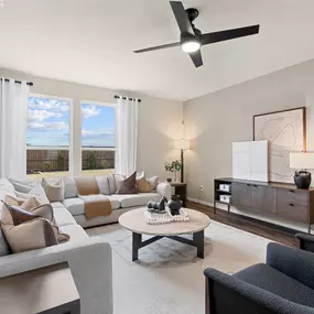 Spacious living area leading into the open concept kitchen.