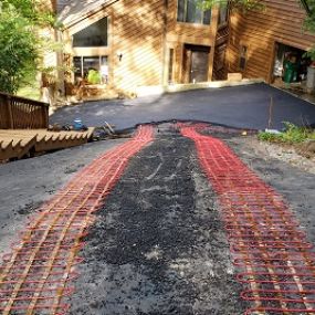 Big City Asphalt Laying Asphalt for a Residential Home