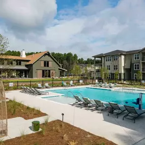 our apartments have a large pool and lounge chairs