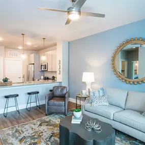 a living room with a couch and a table