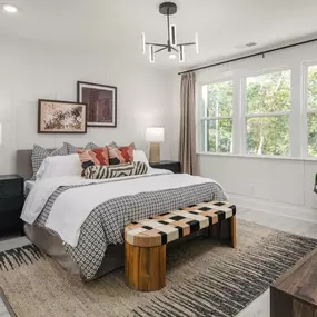 Beautiful primary bedroom suites with multiple walk-in closets